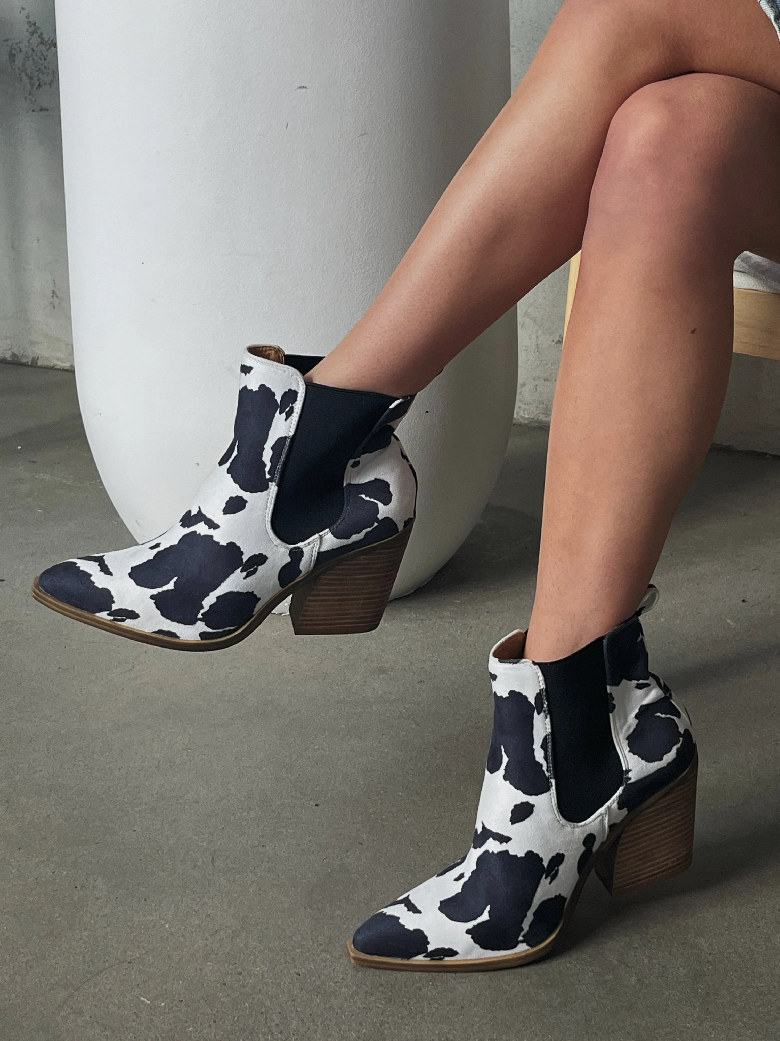 27 Tess Cow Print Bootie